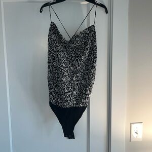 Abercrombie and Fitch black and white Body Suit. Size Medium, great condition!